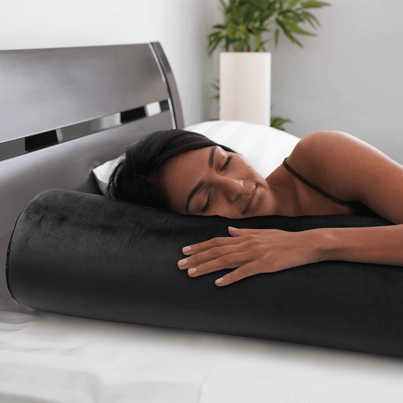 If you're a side sleeper, the Bedroom Body Roll Pillow can be used as a bolster to support your knees and align your spine. | Rulaer