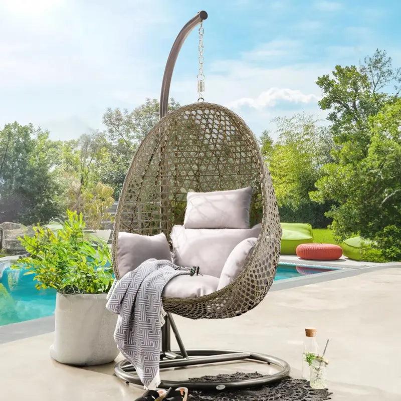 Enhance your poolside area with the Outdoor Hanging Basket Egg Chair Cushion. Its water-resistant properties make it suitable for use near the pool | Rulaercushion