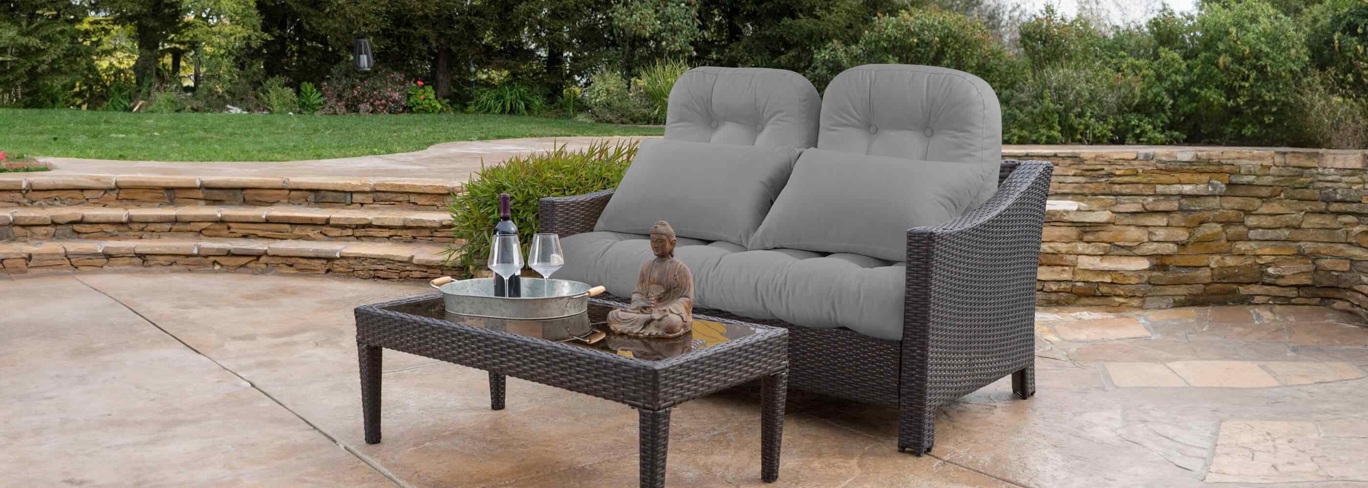 Light gray Patio Wicker Loveseat Cushion Sets on the backyard garden in a peaceful afternoon which also fits most double wicker chairs.| Rulaer cushion