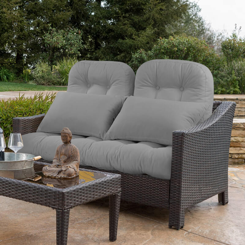 Light gray Patio Wicker Loveseat Cushion Sets on the backyard garden in a peaceful afternoon which also fits most double wicker chairs.| Rulaer cushion